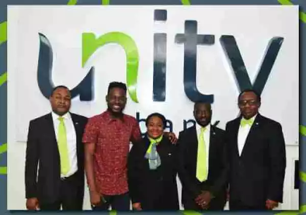 Adekunle Gold Signs Endorsement Deal With Unity Bank (Photos)